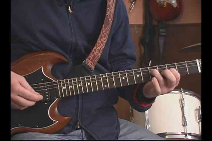 Cómo Jugar "Como Una Piedra" en la Guitarra