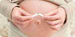 la mujer Embarazada y el cigarrillo